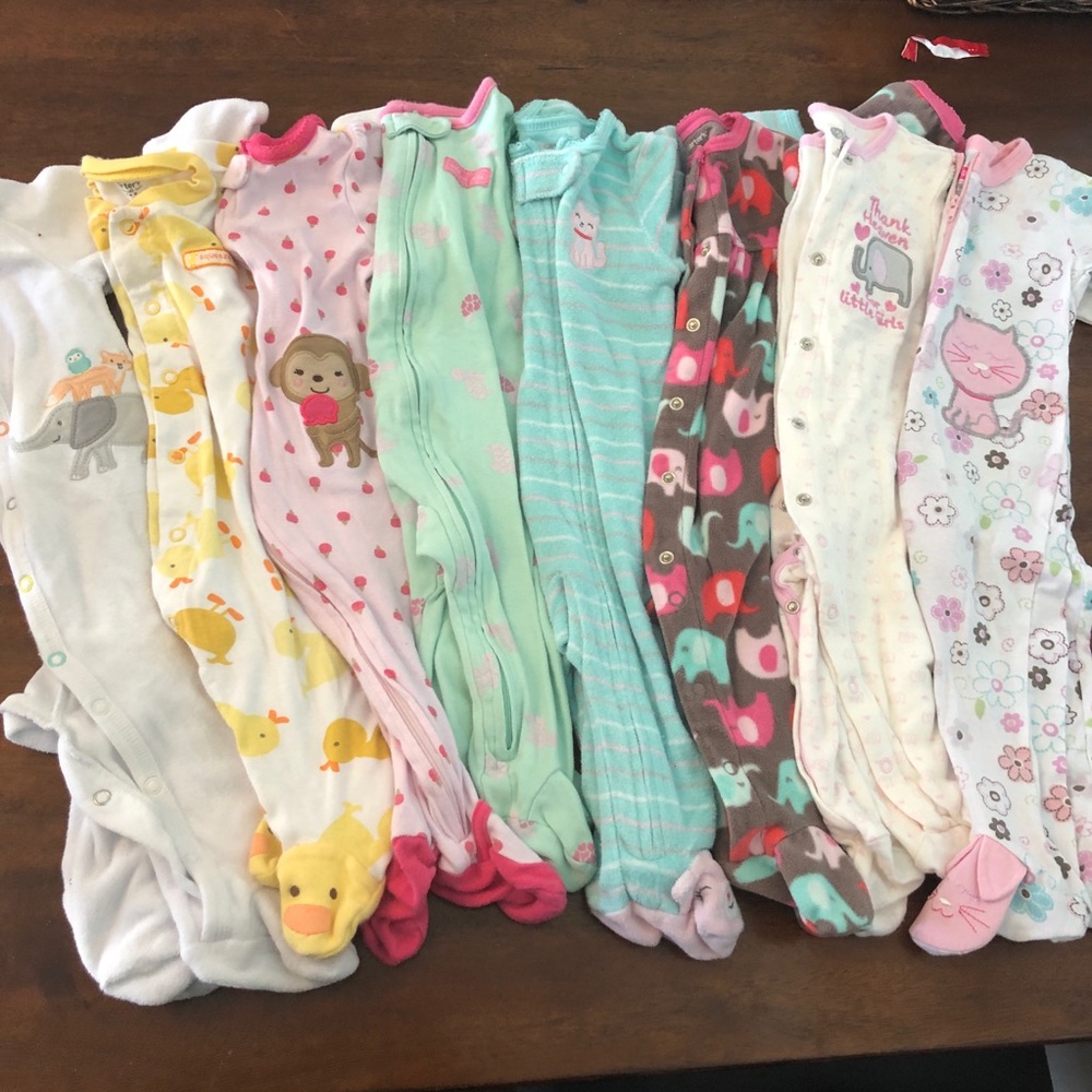 8 pair of footie pajamas
